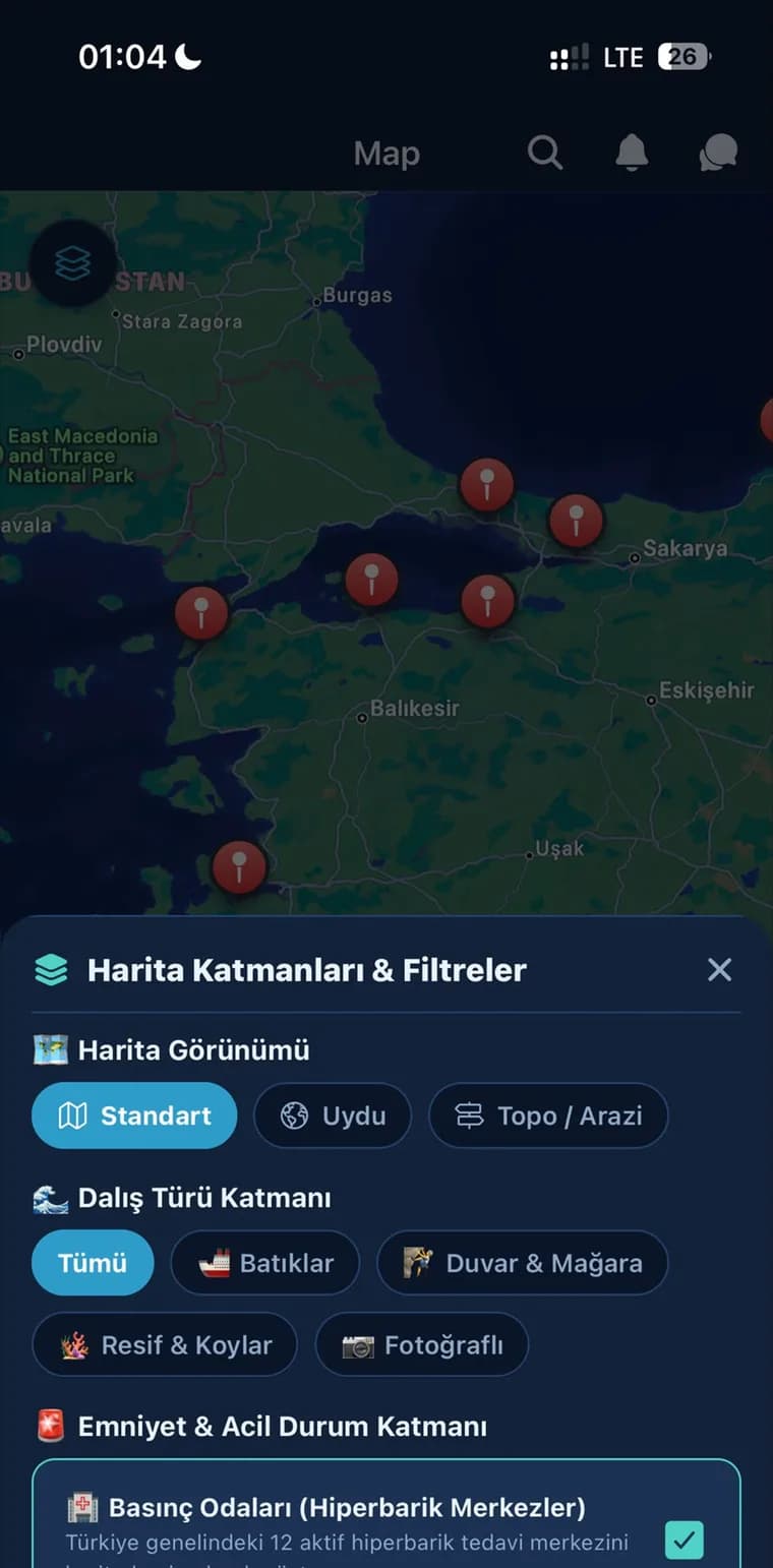 DivePal harita ekranı: uydu ve topo katmanları, batık ve mağara filtreleri, basınç odası katmanı